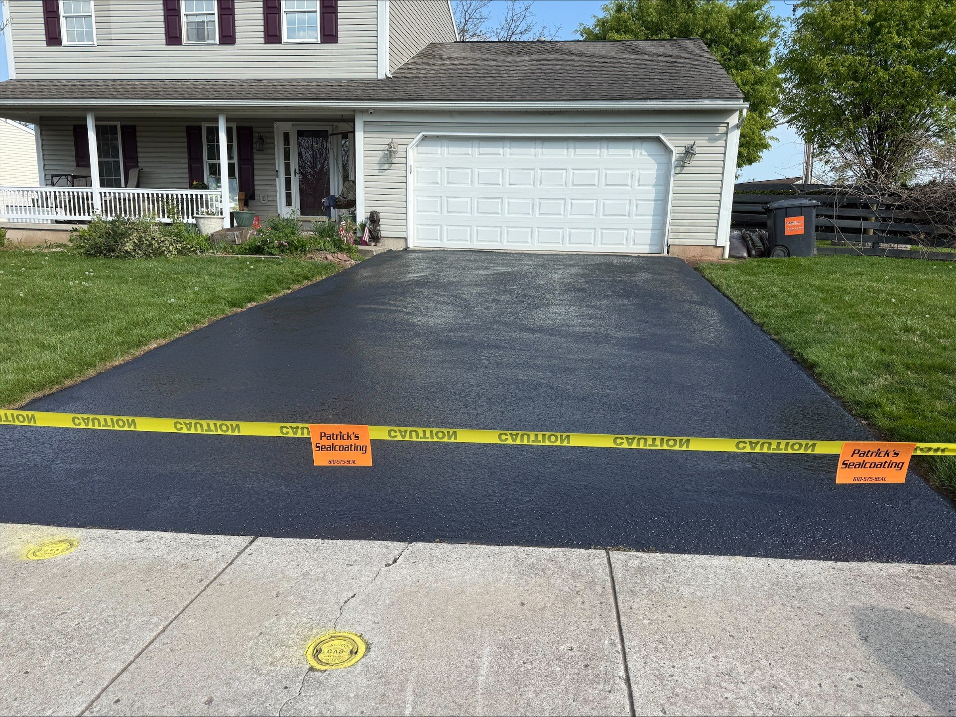 Freshly sealcoated residential driveway